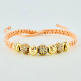 Woven Pink Bracelet with Diamond Cut Beads in 18K Yellow Gold