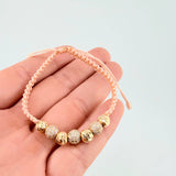 Woven Pink Bracelet with Diamond Cut Beads in 18K Yellow Gold