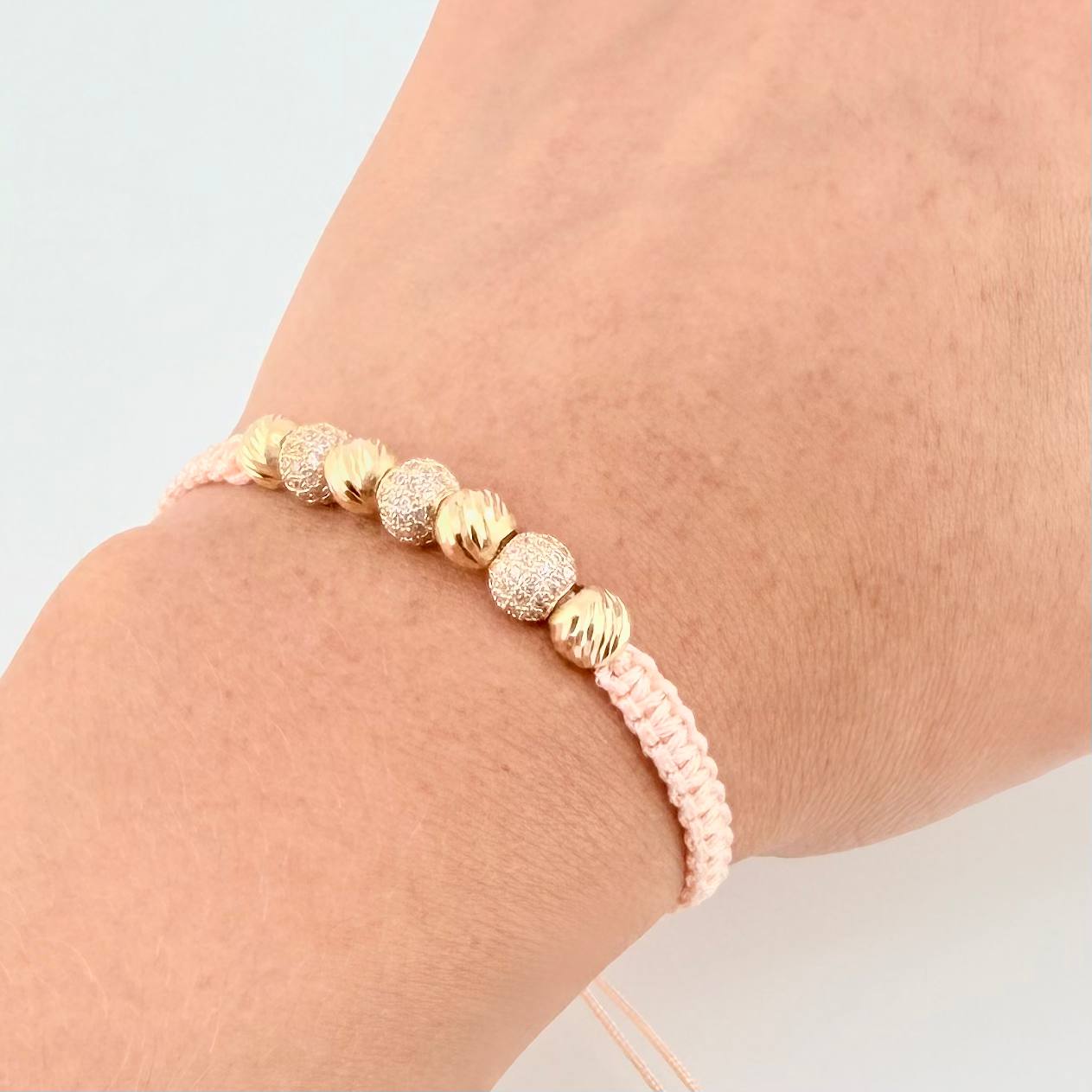 Woven Pink Bracelet with Diamond Cut Beads in 18K Yellow Gold