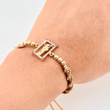 Pulsera Tejida Cafe Jesus Bolas Diamantadas Oro Amarillo 18K