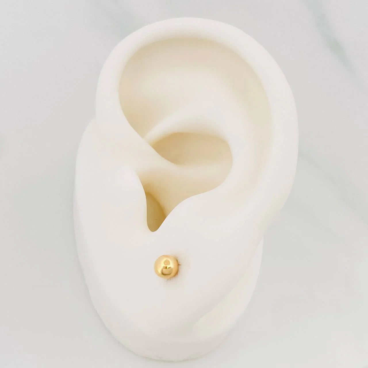 Topos Bola Lisa 0.5 g / in / 4 mm Oro Amarillo 18K