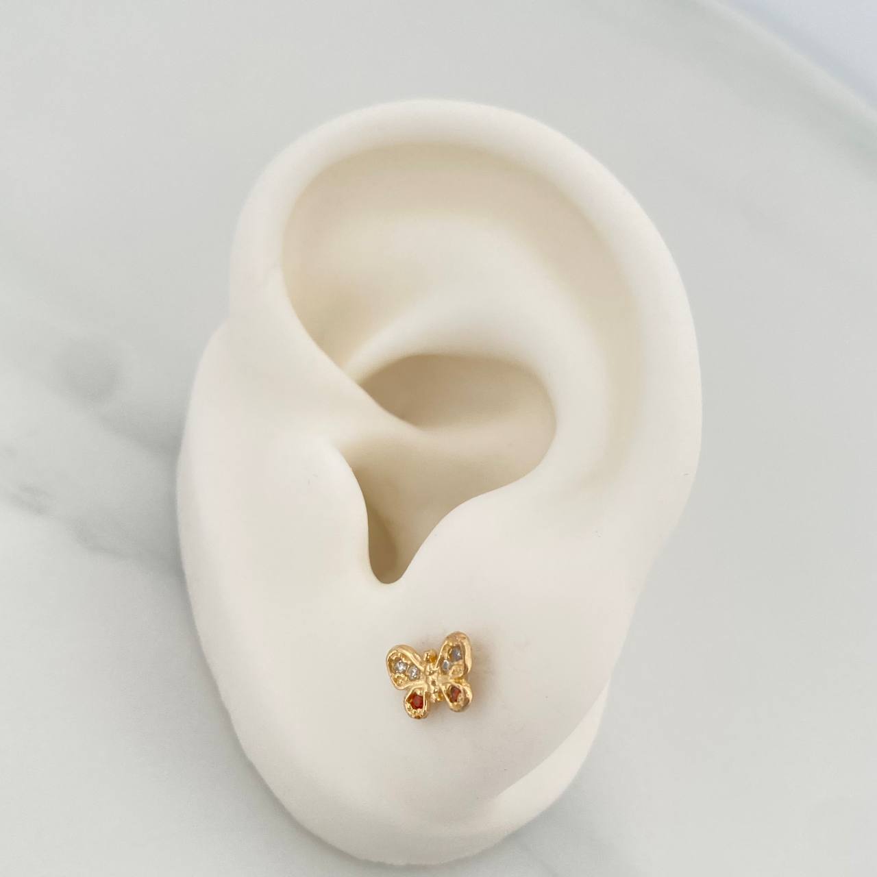 Topos Mariposa 0.9gr / 7.2mm Oro Amarillo 18K %