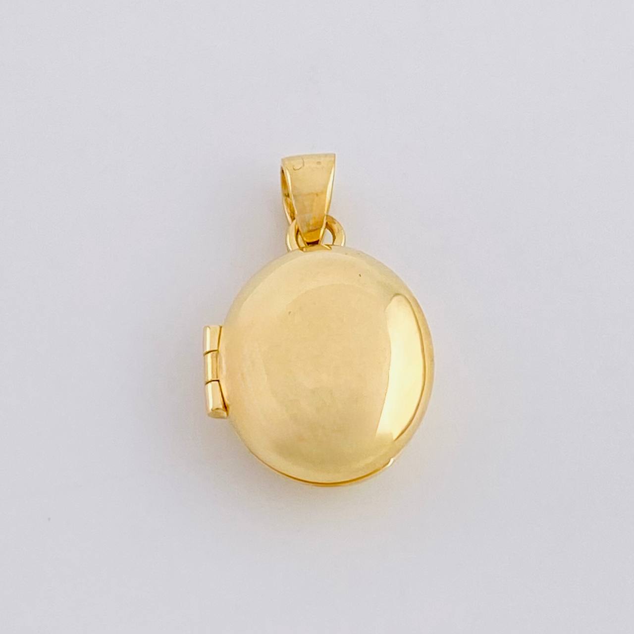 Dije Relicario Ovalo 2.15g / 3/4 in Oro Amarillo 18K