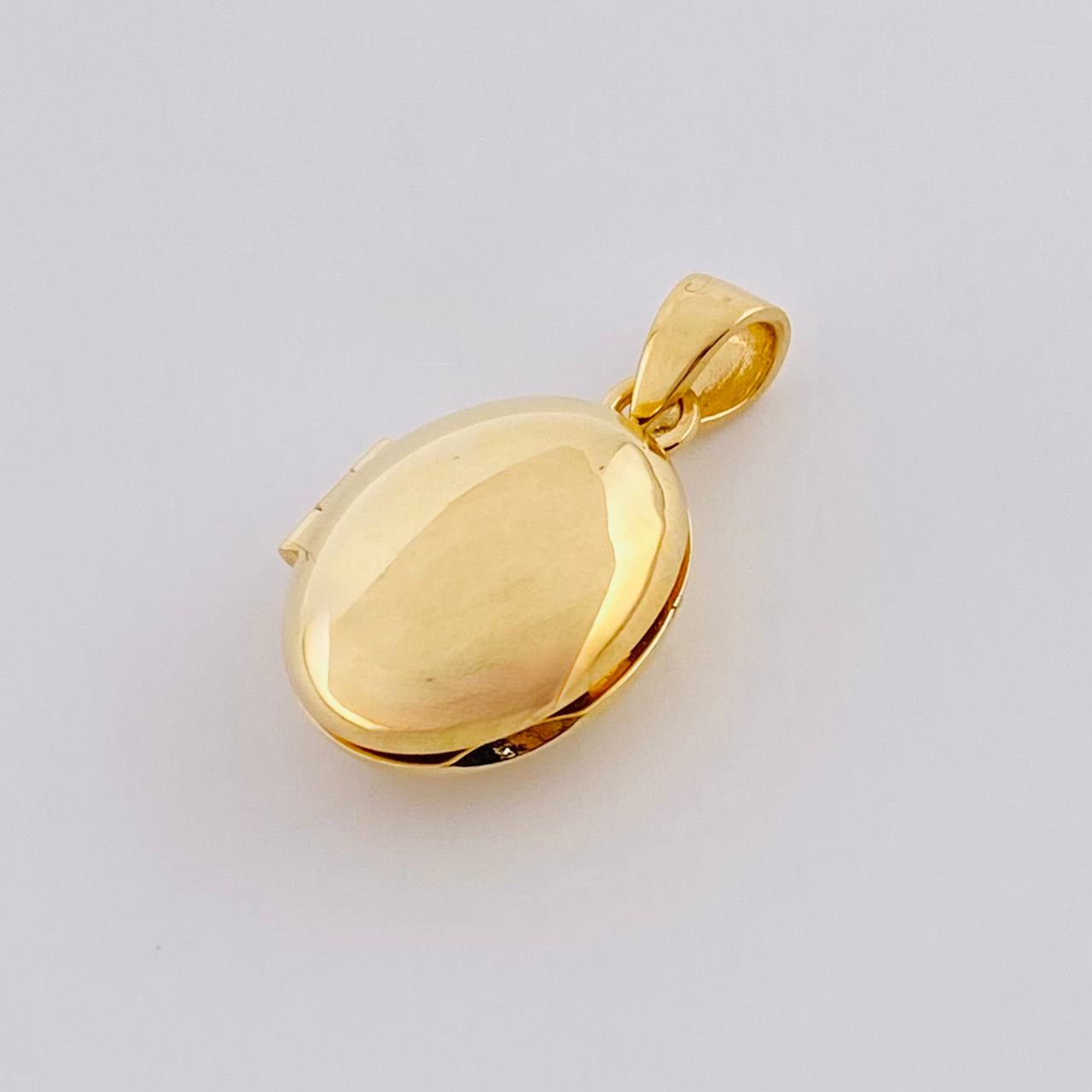 Dije Relicario Ovalo 2.15g / 3/4 in Oro Amarillo 18K