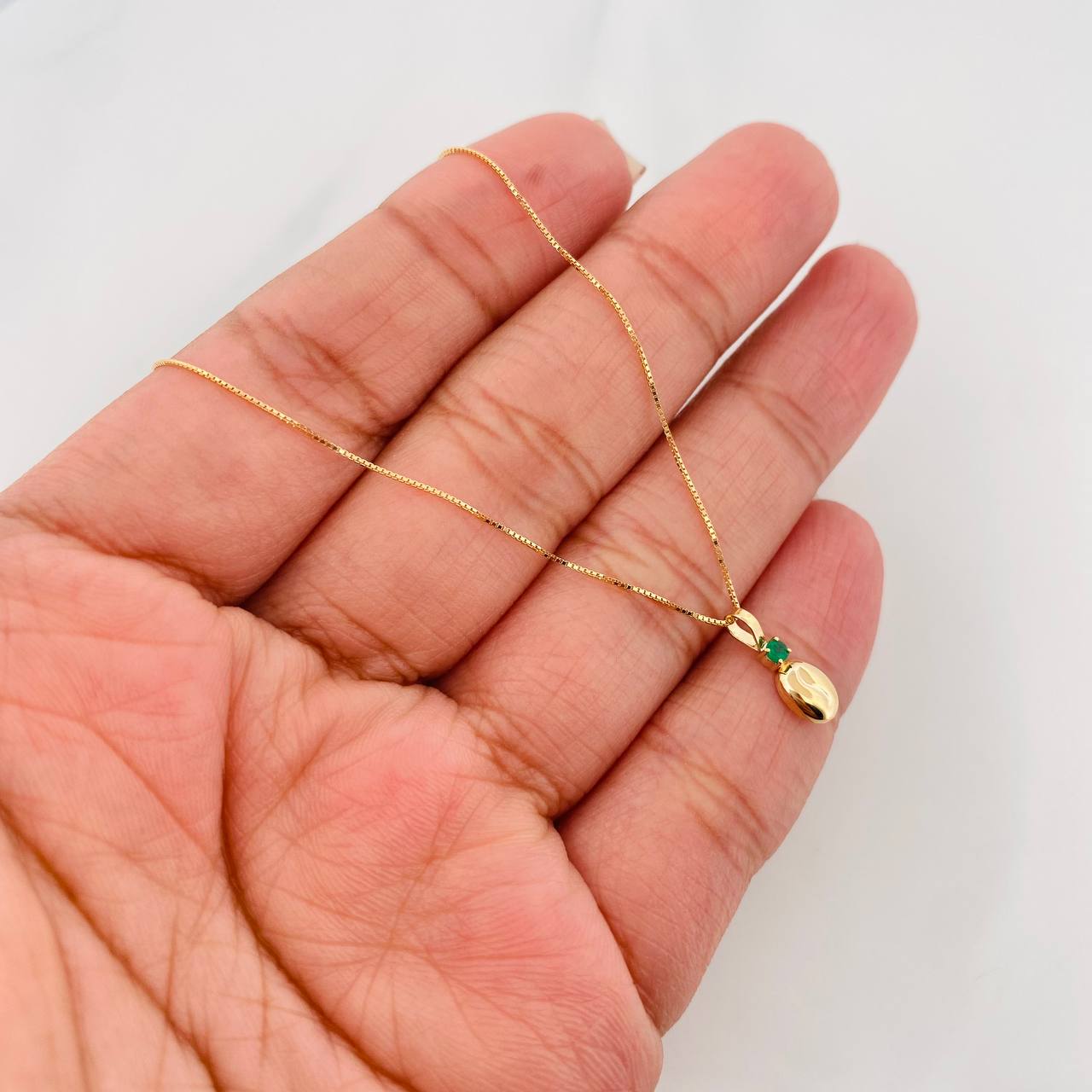 Set Cadena Veneciana + Dije Grano Cafe Esmeralda 03Pts / 1.25 g / 17 3/4 in Oro Amarillo 18K