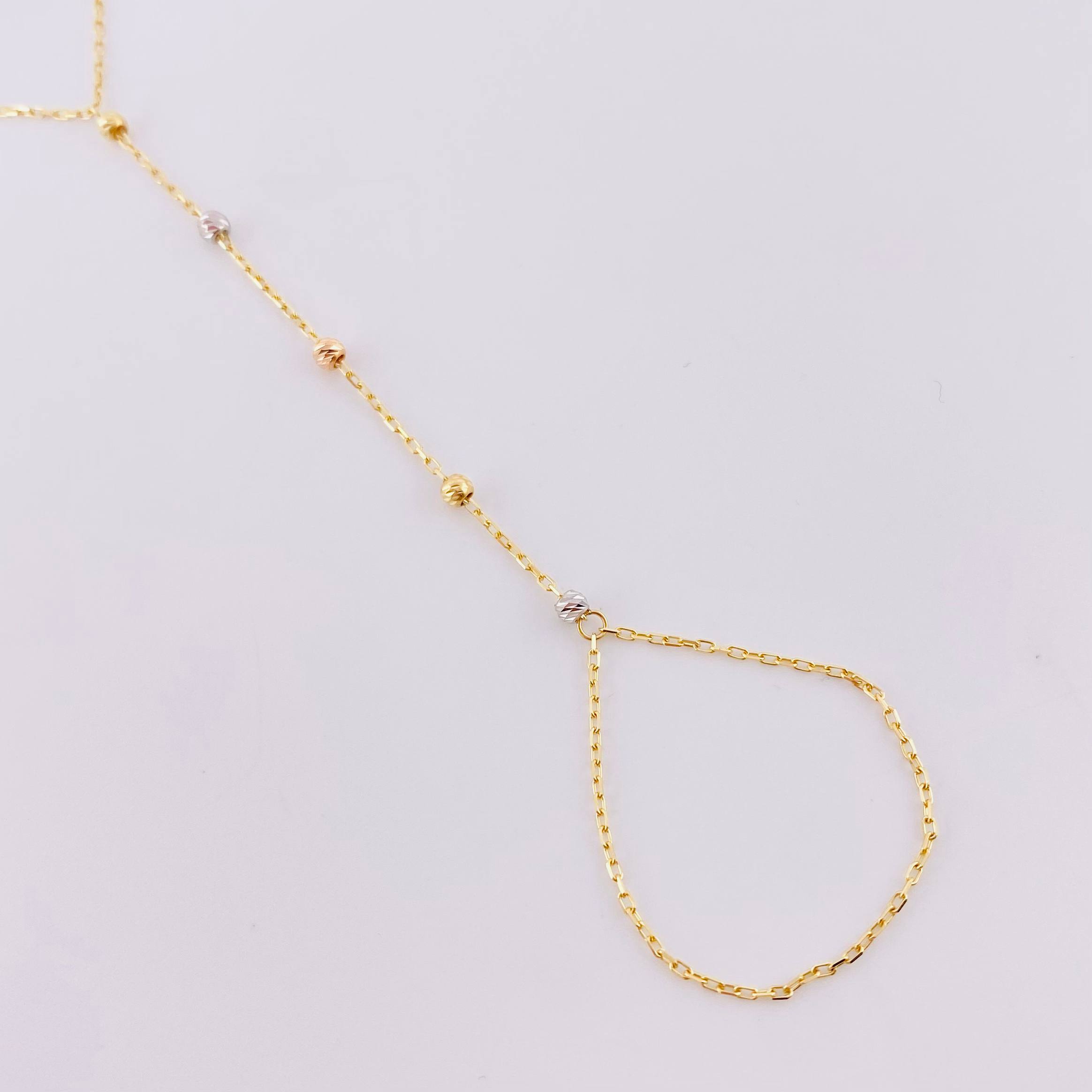 Arabian Bracelet with Diamond Cut Beads 1.5g / 7 3/4 in / 0.7mm Three Golds 18K