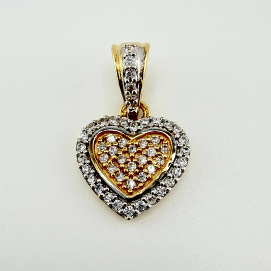 Dije Corazon Tupido 1.45gr / 3/4 in / Dos Oros Amarillo Blanco 18K