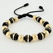 Pulsera Negra Neoros 9und Bolas 10und 2.5gr / 7mm Oro Amarillo 18K ©