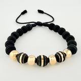 Pulsera Negra Neoros 3und Bolas 4und 1gr / 7mm Oro Amarillo 18K ©