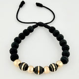 Pulsera Negra Neoros 3und Bolas 4und 1gr / 7mm Oro Amarillo 18K ©