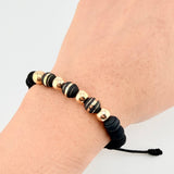 Pulsera Negra Neoros 3und Bolas 4und 1gr / 7mm Oro Amarillo 18K ©