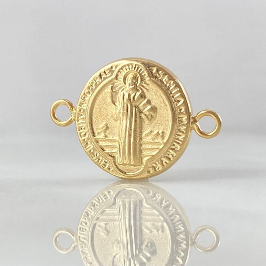Herraje San Benito 1.1gr / 2.1cm / Troquelado Oro Amarillo 18K