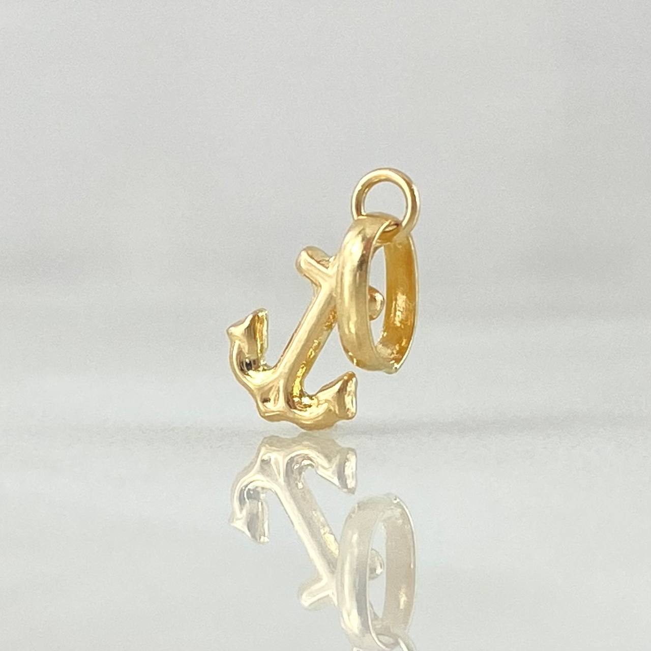 Dije Ancla 0.25gr / 1.4cm / Oro Amarillo 18K