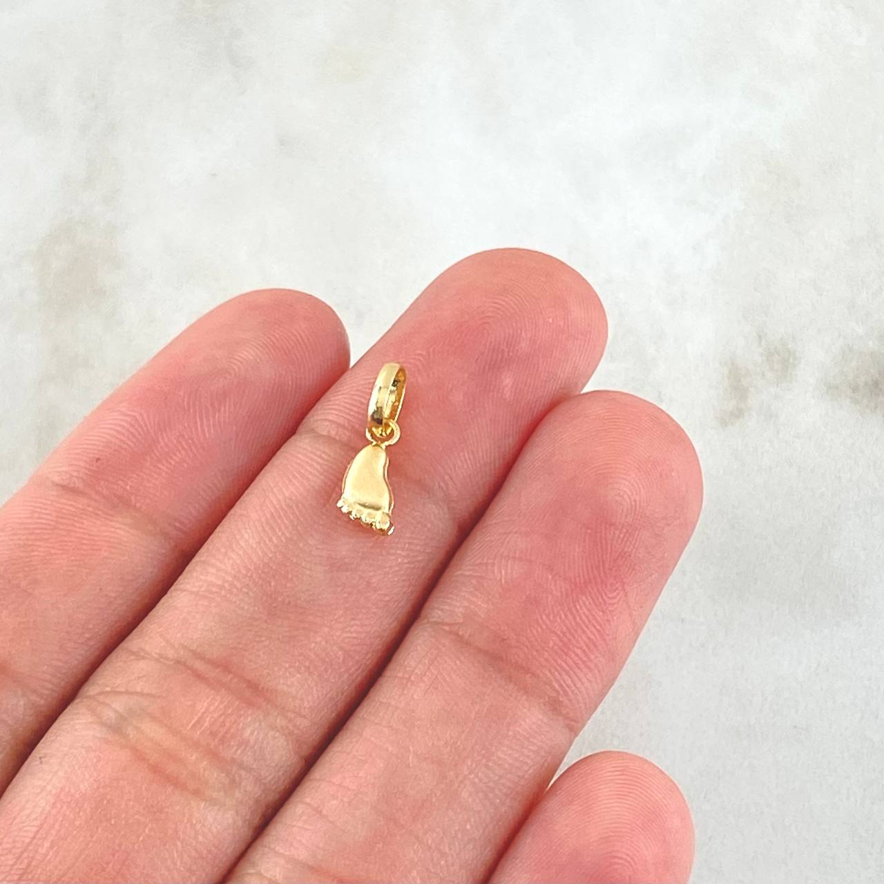 Dije Huella Pie 0.2gr / 1.4cm / Oro Amarillo 18K