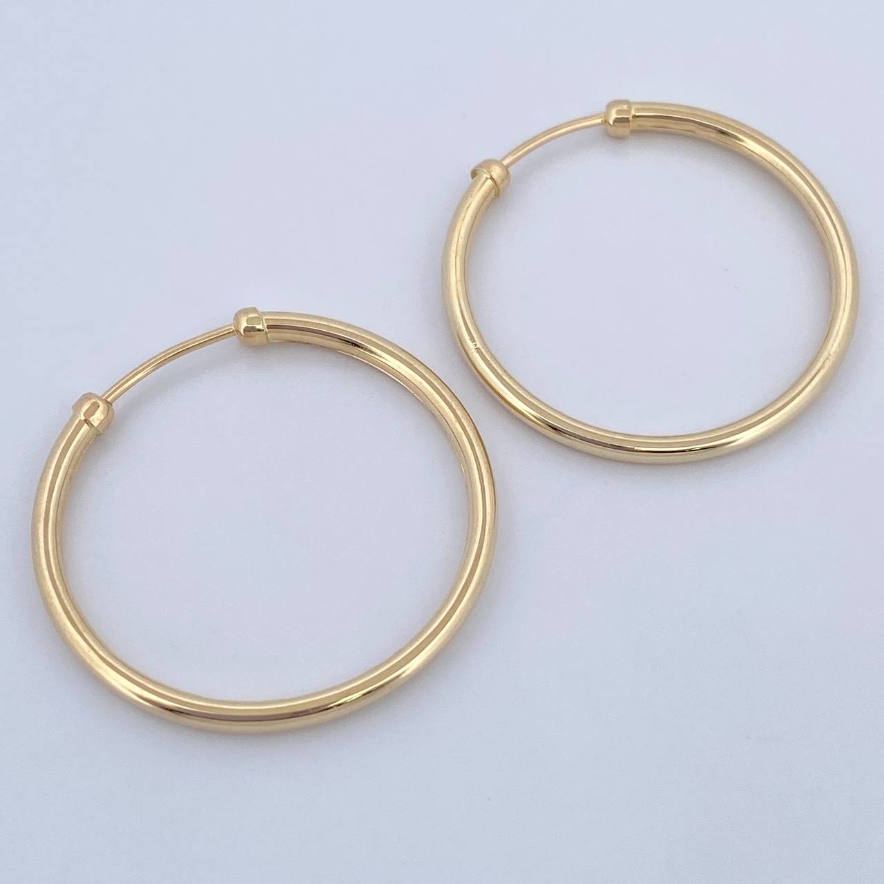 Candongas Caponeras 2.35gr / 2.6cm / Oro 18K $