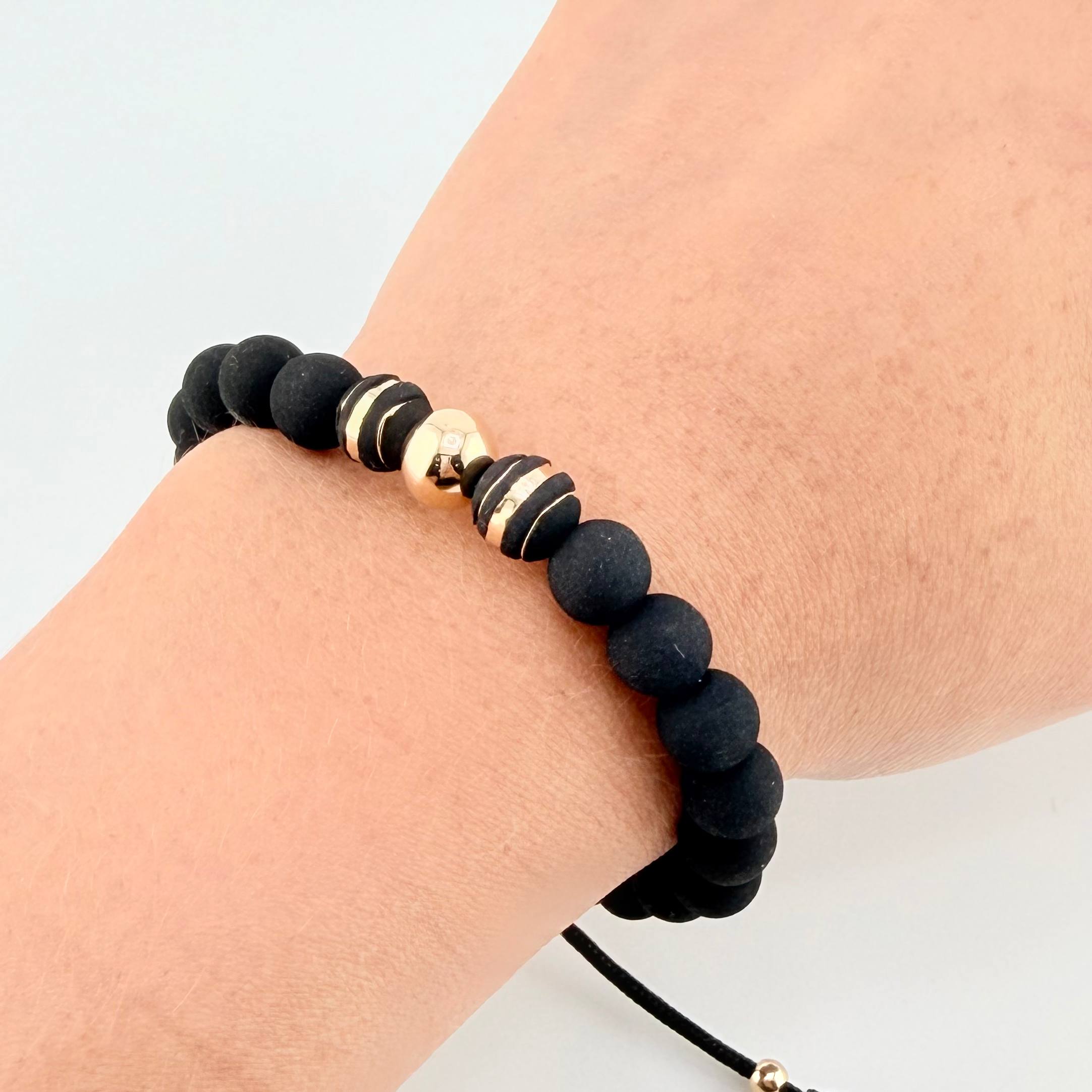 Pulsera Negra Trío Neoros 2und Bolas 3und / 4mm-8mm Oro Amarillo 18K *