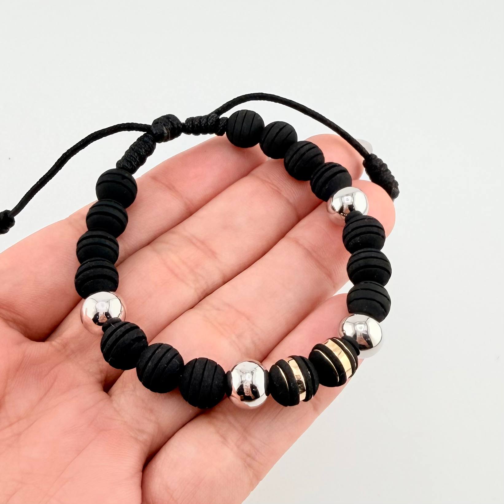 Pulsera Negra Neoros 2und Bolas 4und / 8mm Dos Oros Amarillo Blanco 18K *