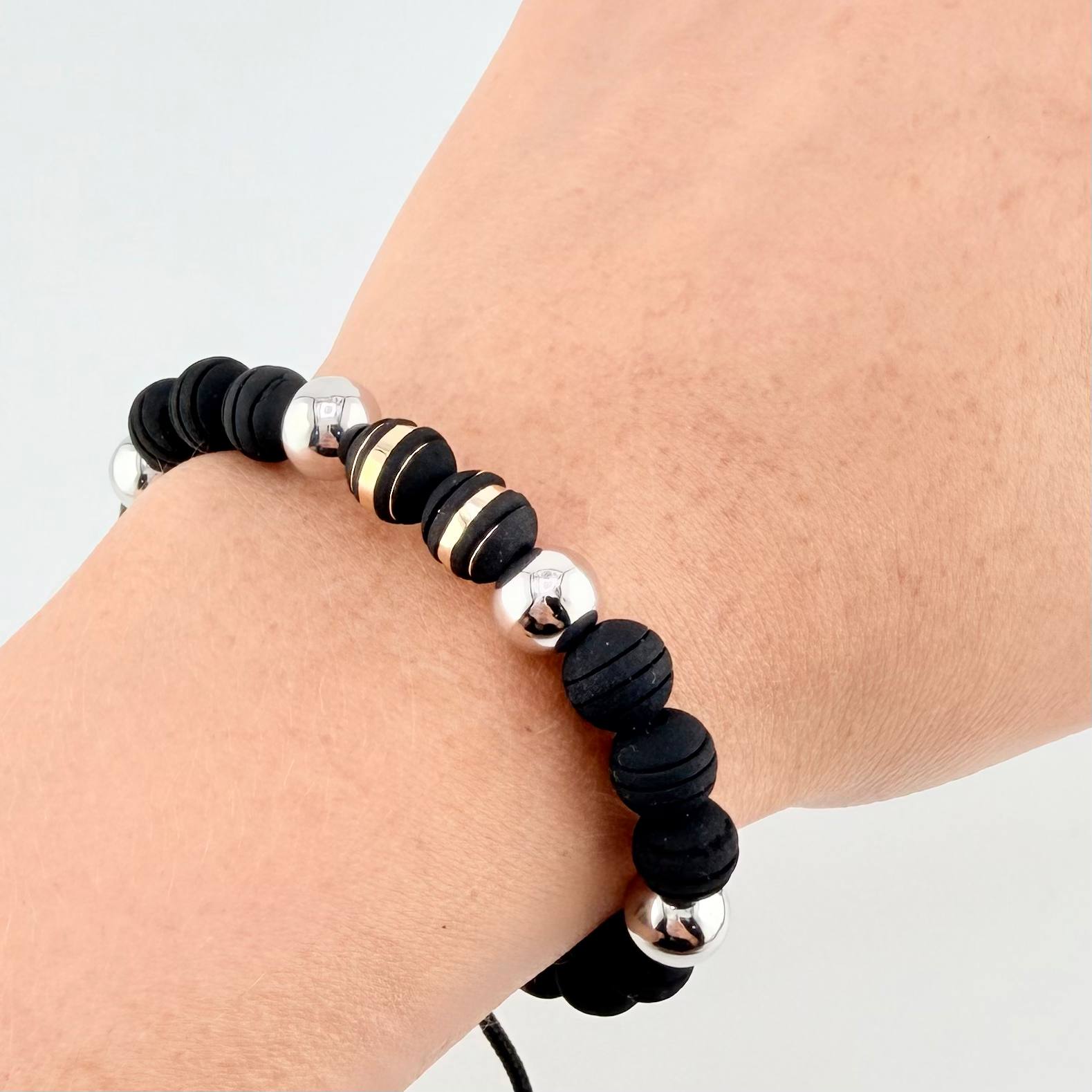 Pulsera Negra Neoros 2und Bolas 4und / 8mm Dos Oros Amarillo Blanco 18K *