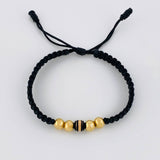 Pulsera Tejida Hilo Negro 4 Balines Lisos y Un Neoro Oro Amarillo 18K