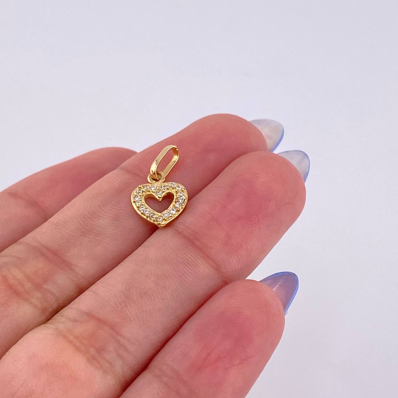 Dije Silueta Corazón Tupido 0.7gr / 3/4 in / Oro Amarillo 18K ©