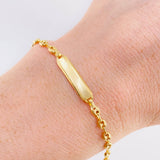 Pulso Bebé Gc Placa Rectangular Curva 1.5gr / 5 3/4 in / 3.2mm Oro Amarillo 18K