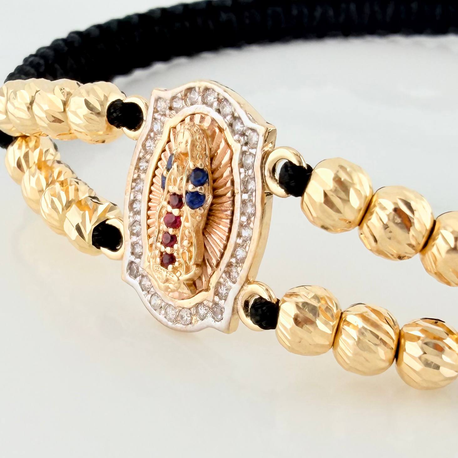 Pulsera Tejida Negra Virgen Guadalupe Tres Oros 18K