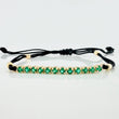 Pulsera Tejida Negra Tennis Oro Amarillo 18K
