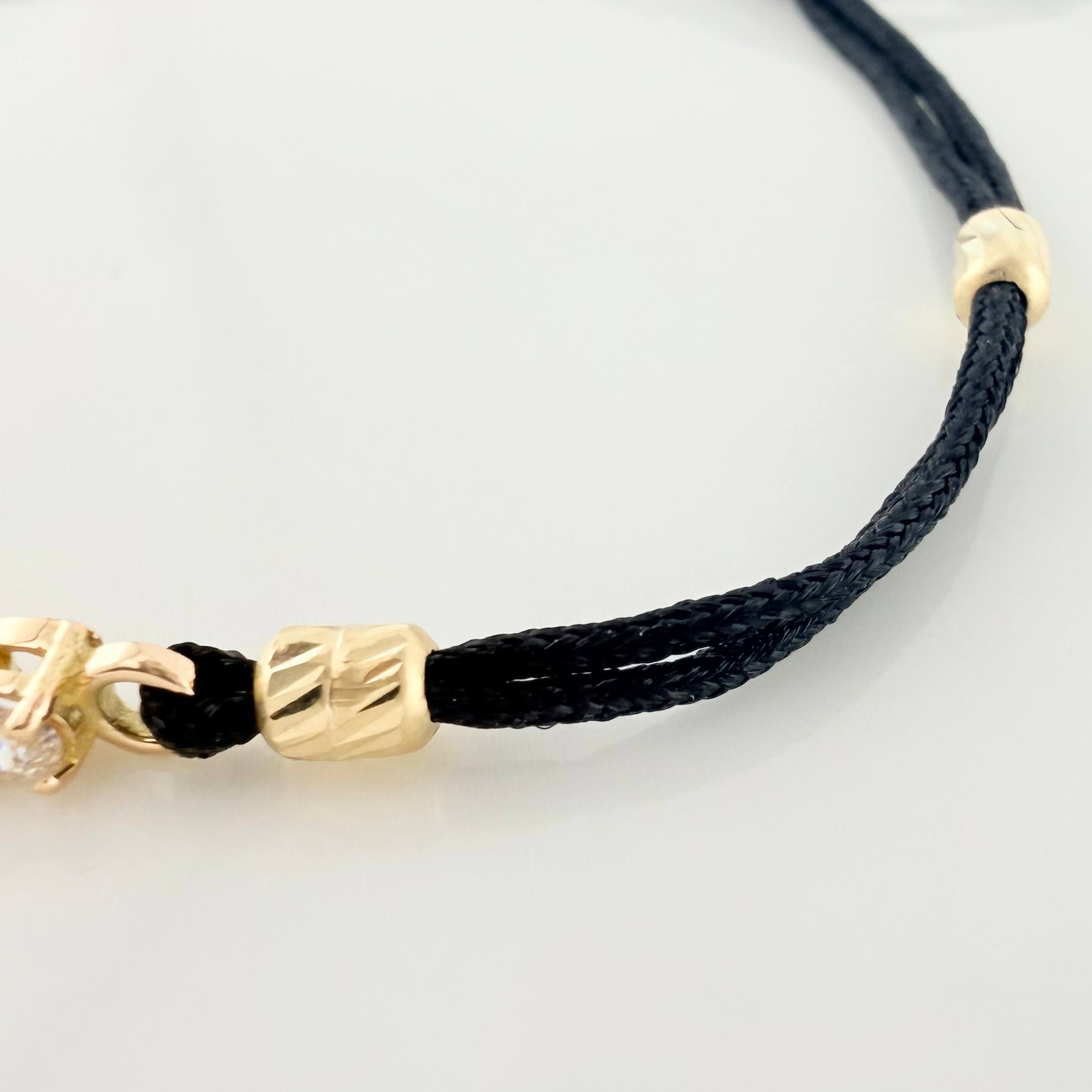 Pulsera Tejida Negra Retazo Tennis Oro Amarillo 18K