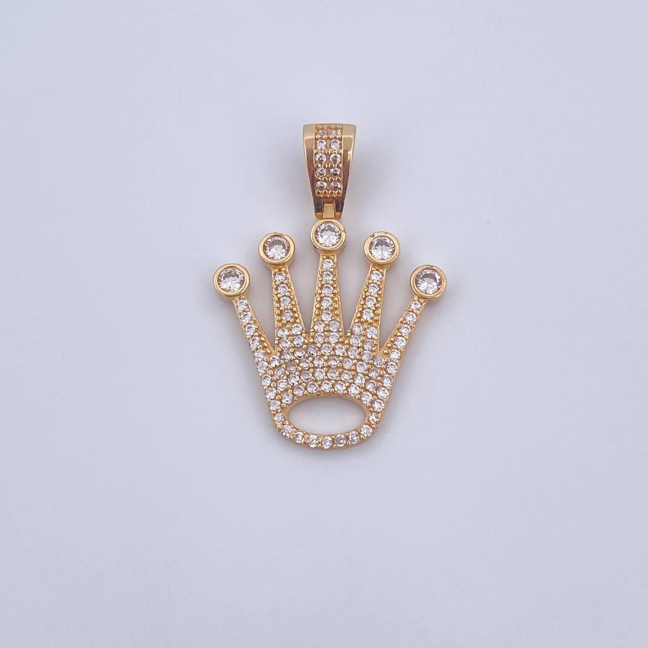 Dije Corona RX 3.55gr / 3.1cm / Circones Blancos Oro Amarillo 18K $