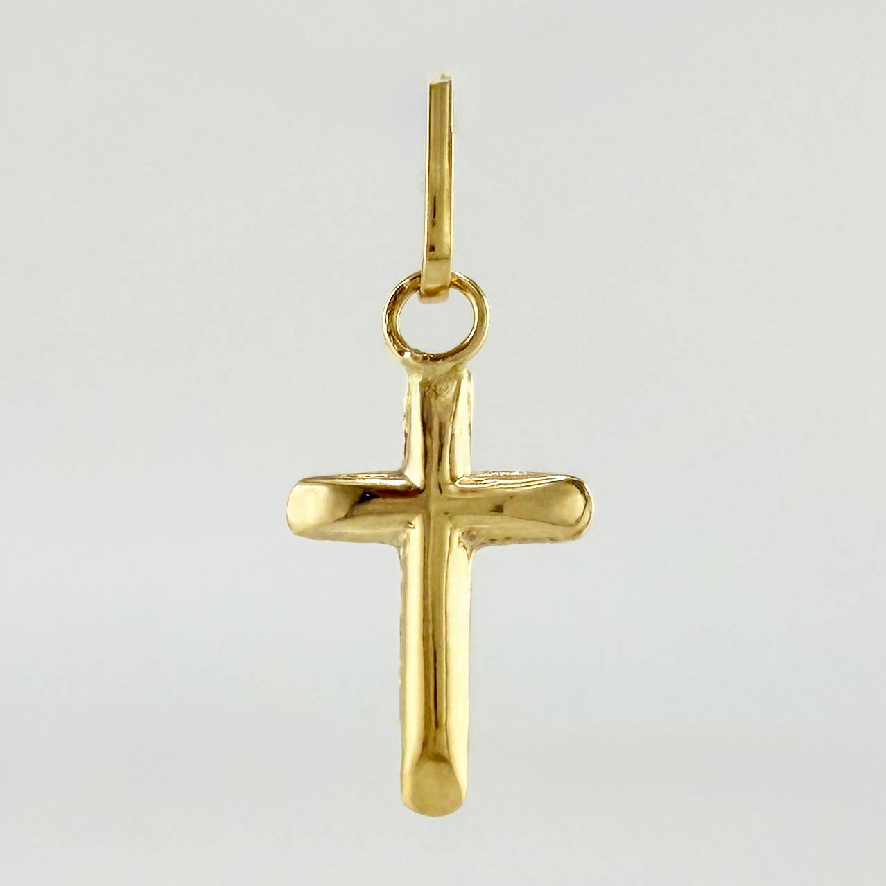 Dije Cruz 0.15gr / 3/4 in / Oro Amarillo 18K