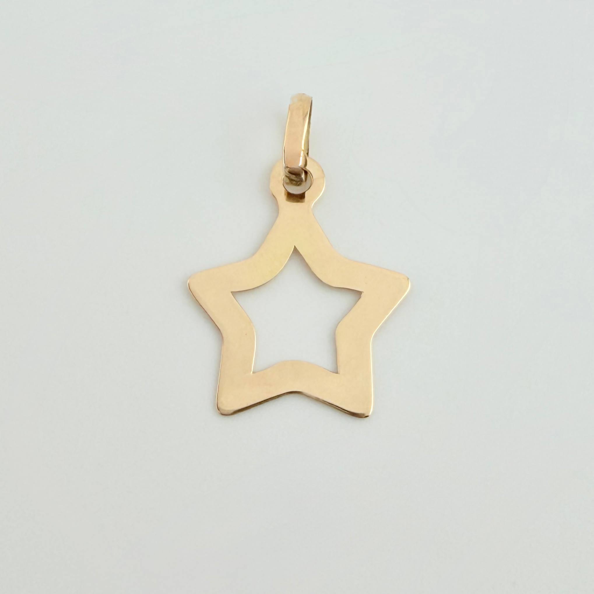 Dije Estrella Silueta 0.45 g / 3/4 in Oro Amarillo 18K
