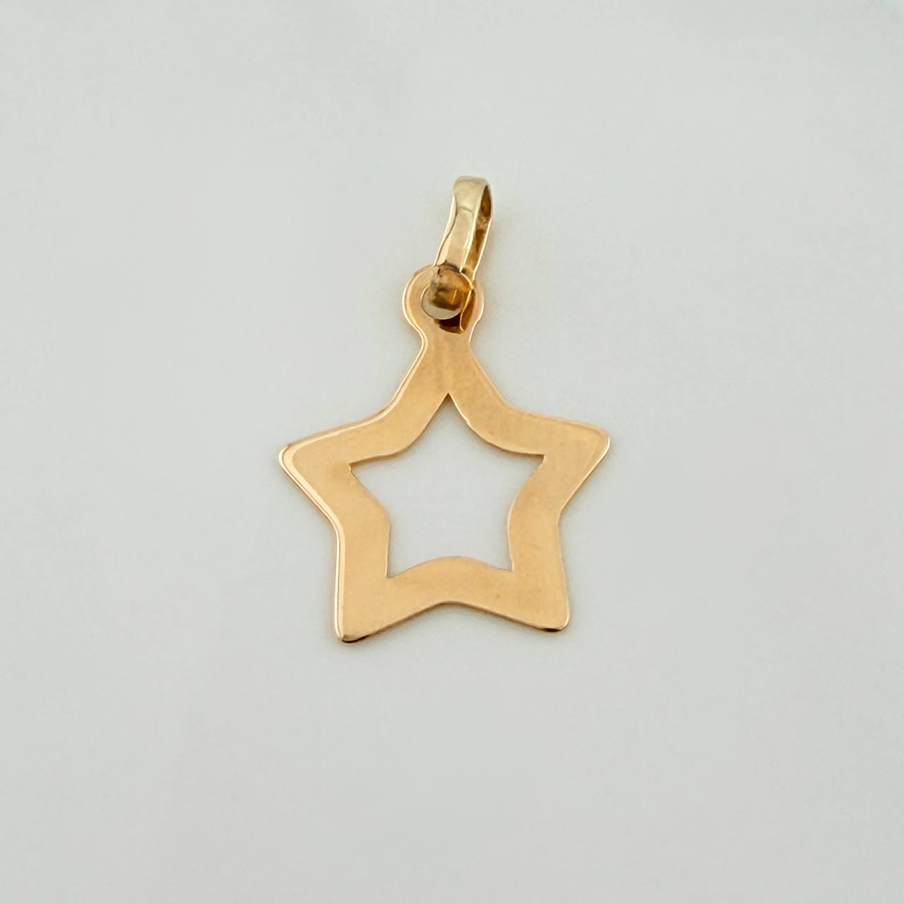 Dije Silueta Estrella 0.45gr / 3/4 in / Oro Amarillo 18K %
