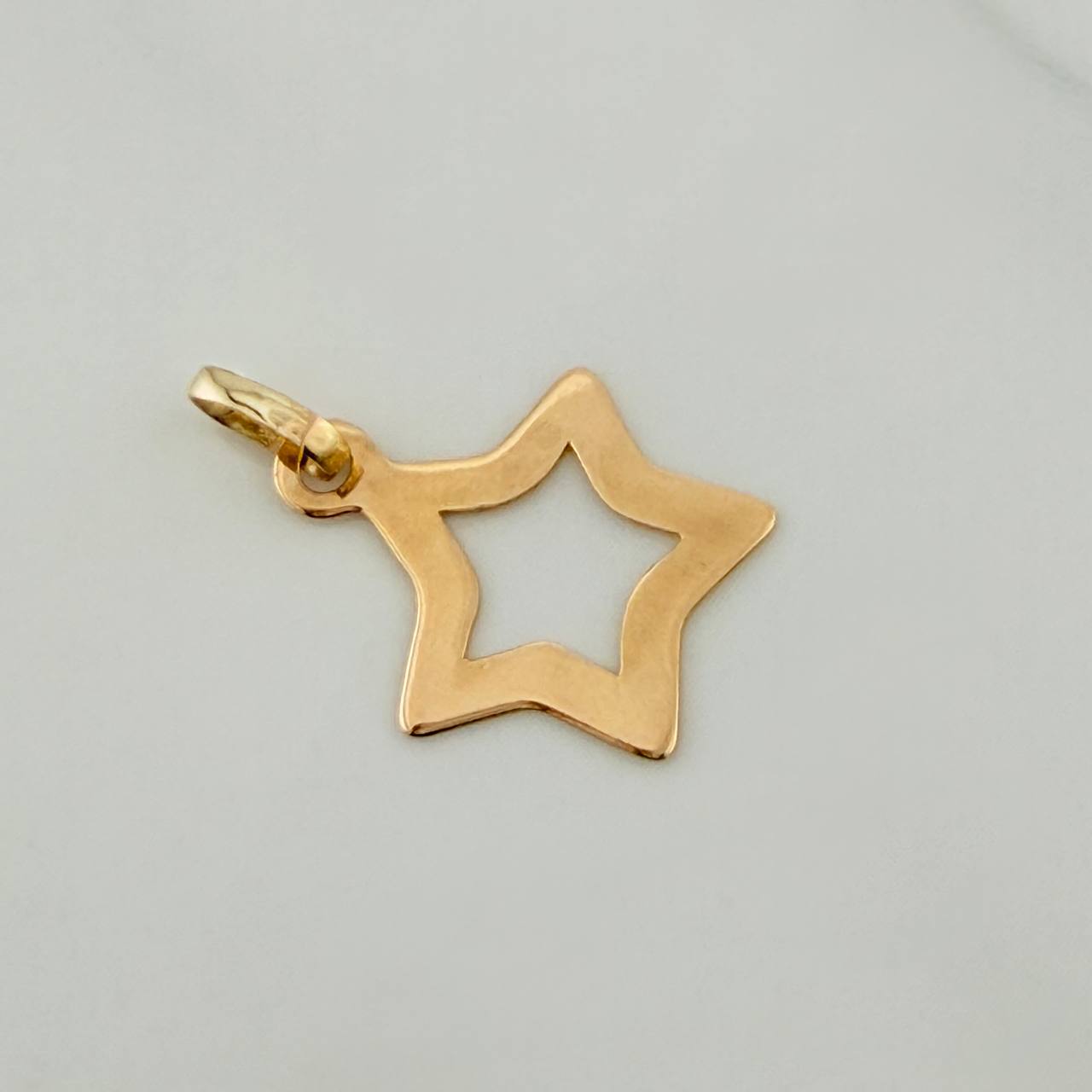 Dije Silueta Estrella 0.45gr / 3/4 in / Oro Amarillo 18K %