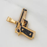 Dije Pistola 11.75gr / 1 1/4 in / Dos Oros Negro Amarillo 18K $