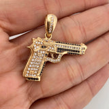 Dije Pistola 12.6gr / 1 1/2 in / Oro Amarillo 18K $