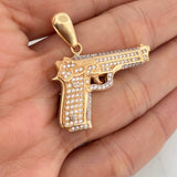 Dije Pistola 11.6gr / 1 1/2 in / Dos Oros Amarillo Blanco 18K $