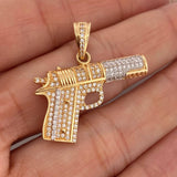 Dije Pistola 5.2gr / 1 1/4 in / Dos Oros Amarillo Blanco 18K $