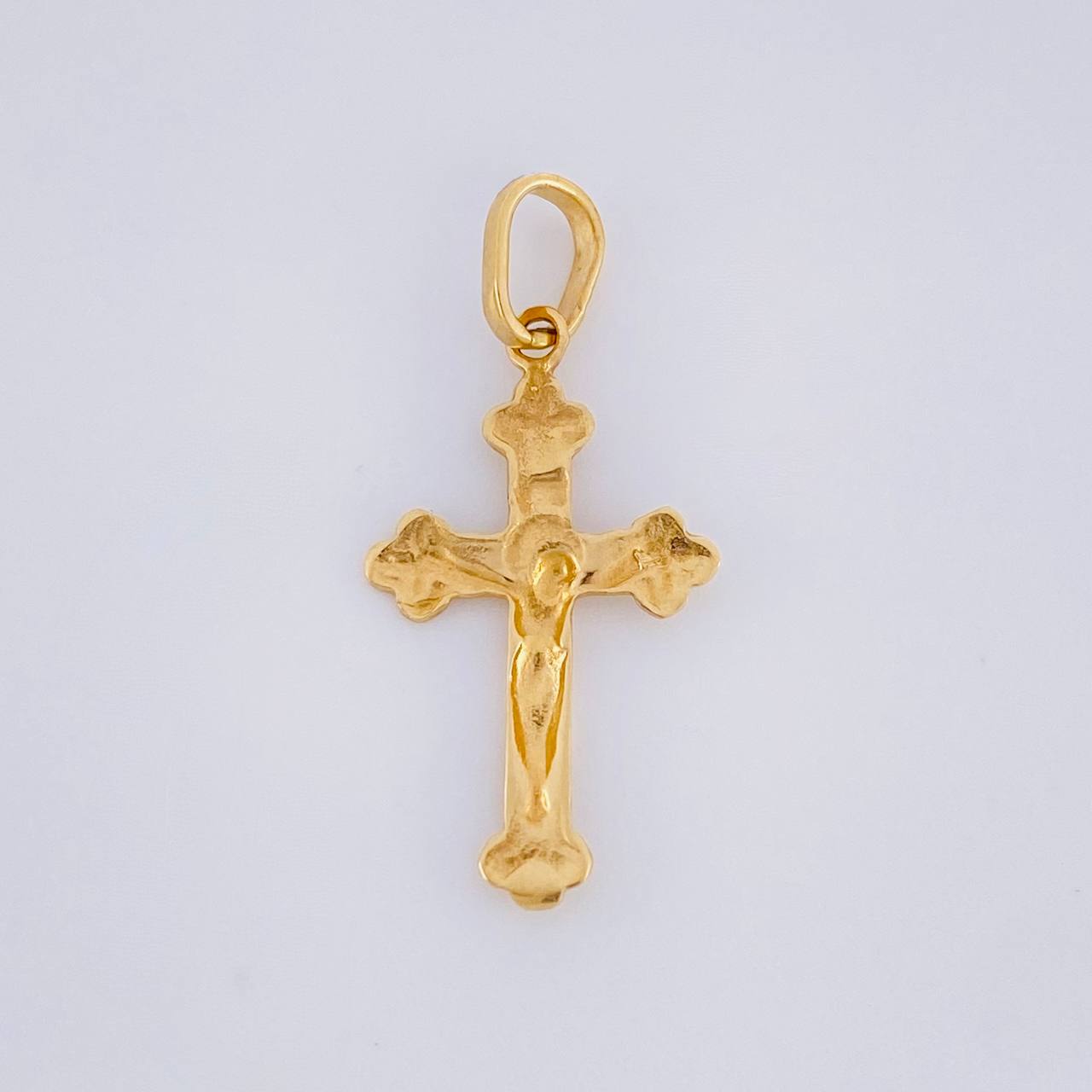 Dije Cruz Cristo 0.6g / 1/2 in Oro Amarillo 18K