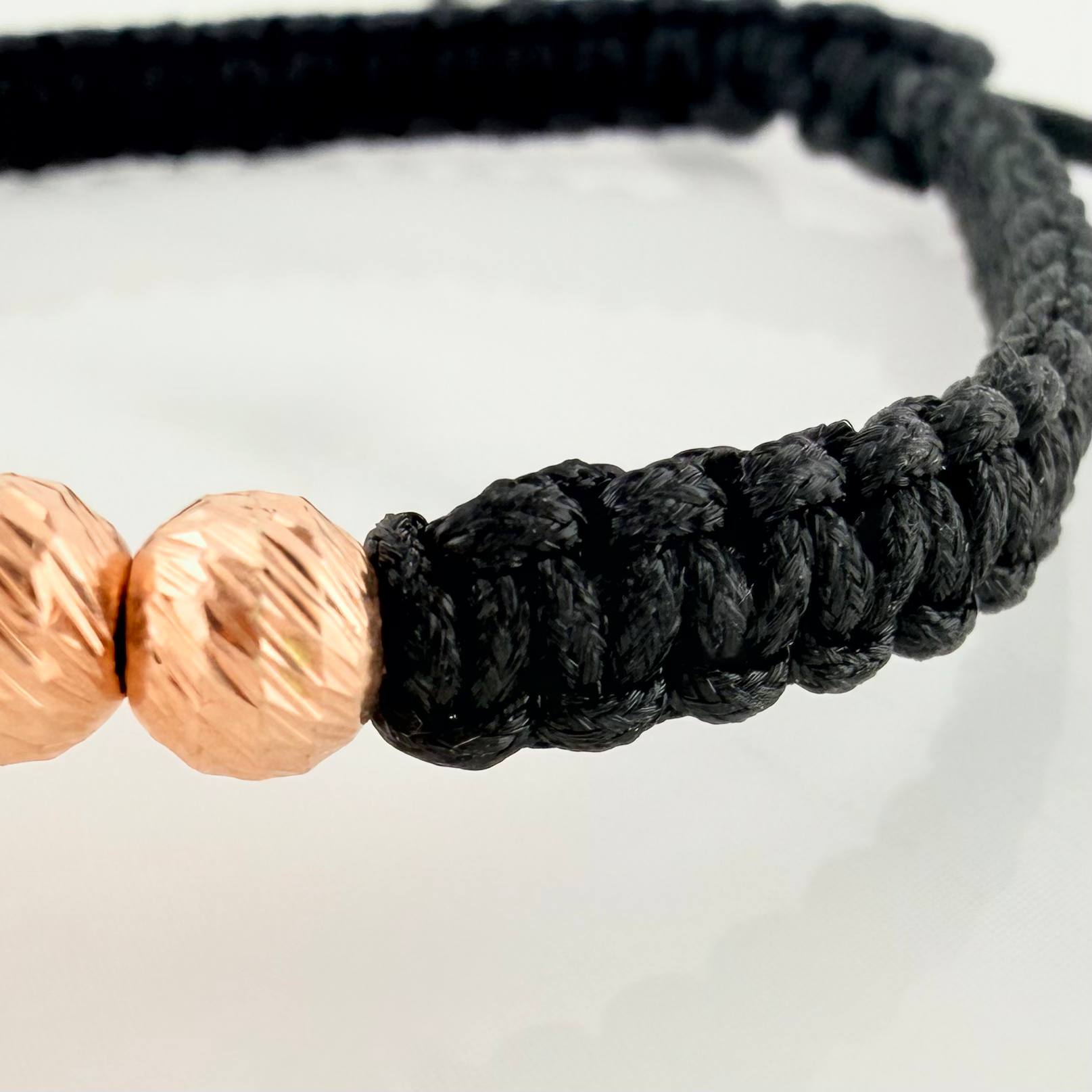 Pulsera Tejida Negra San Miguel Oro Rosa 18K