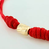 Red Woven Bracelet Seven Knots Yellow Gold 18K