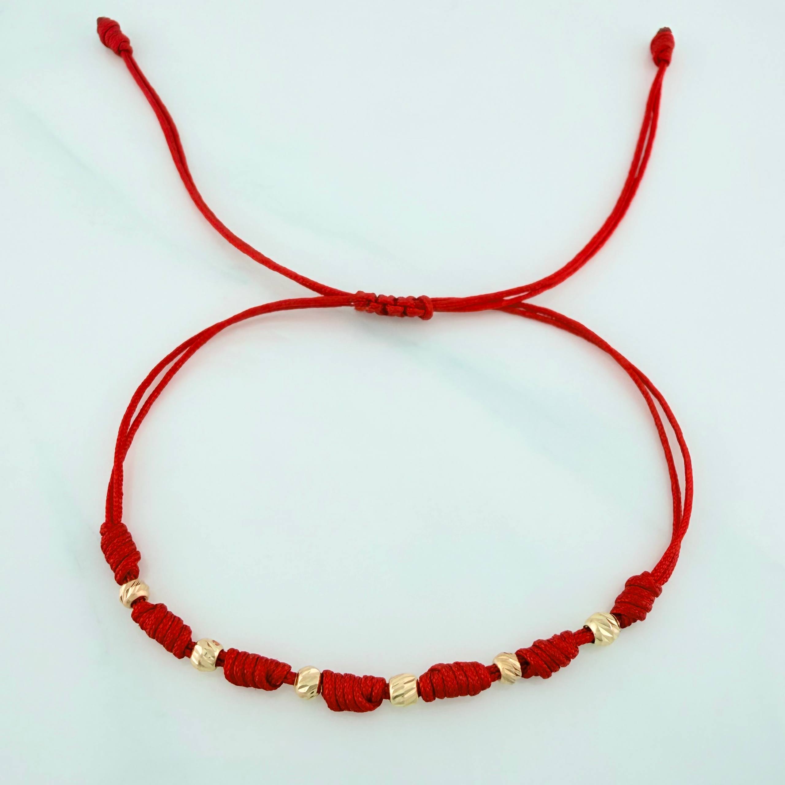 Red Woven Bracelet Seven Knots Yellow Gold 18K