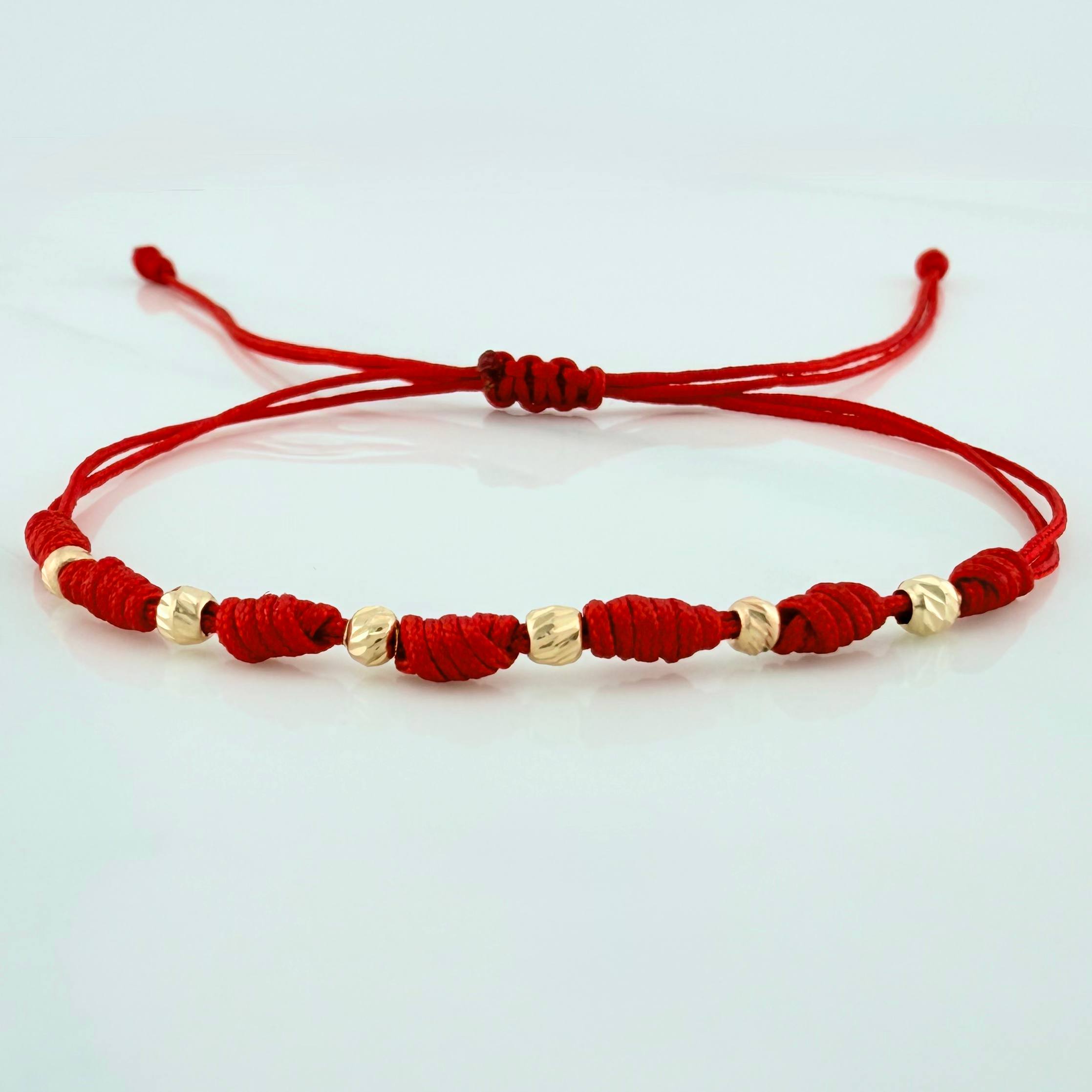 Red Woven Bracelet Seven Knots Yellow Gold 18K