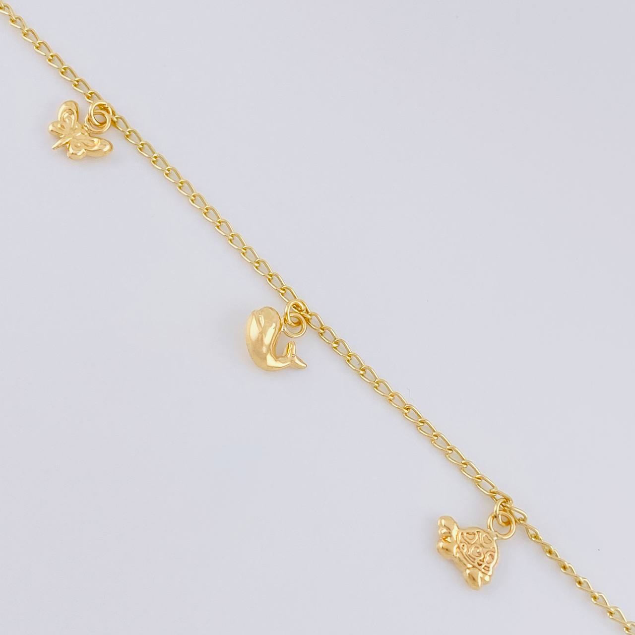 Pulso Espiga Dijes Animales 2.6 g / 7 1/2 in / 1.6 mm Oro Amarillo 18K