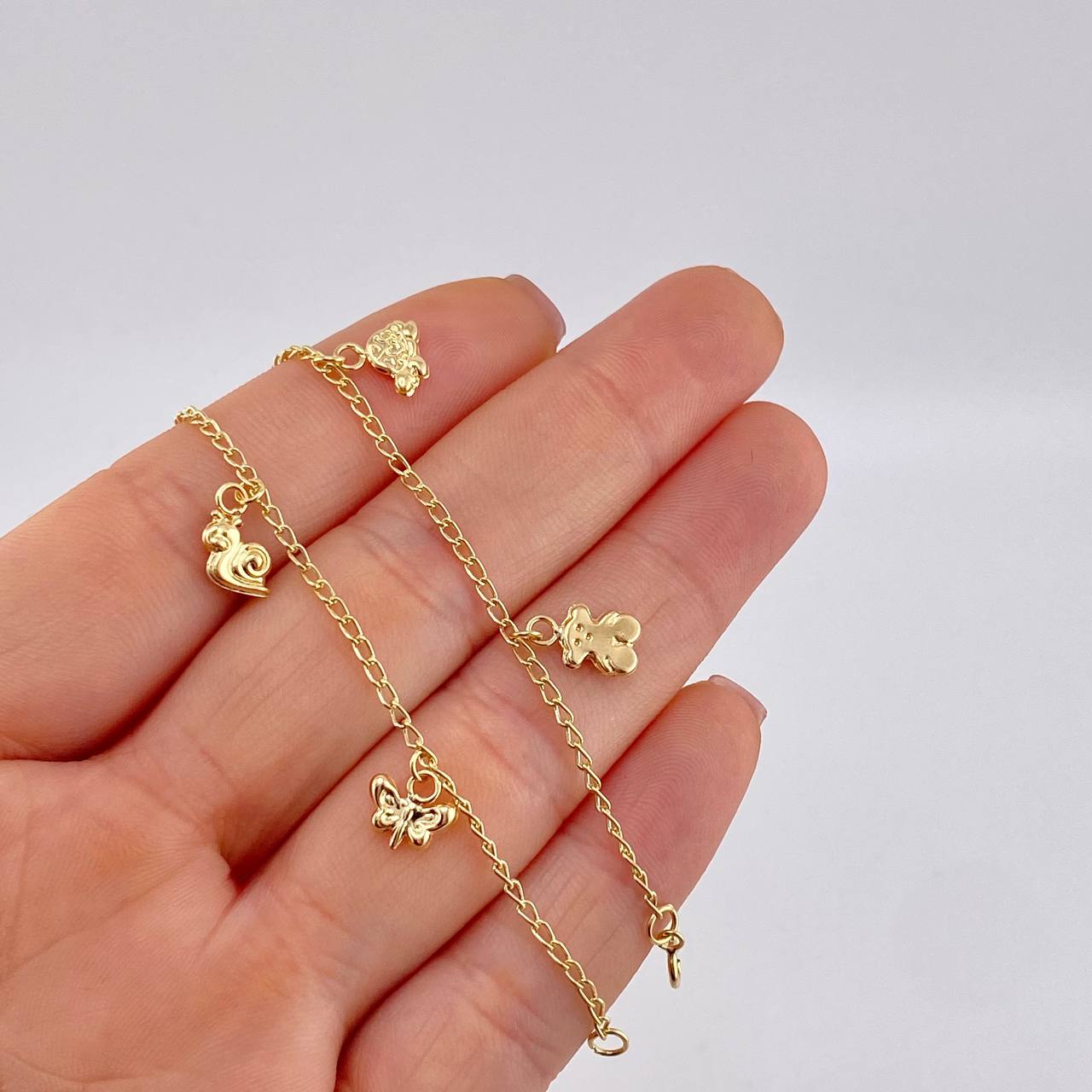 Pulso Espiga Dijes Animales 2.7 g / 7 1/2 in / 1.6 mm Oro Amarillo 18K