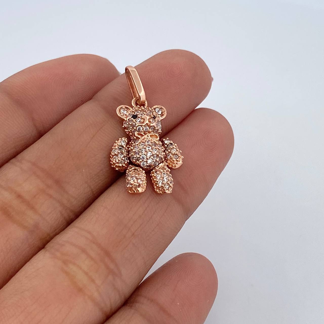 Dije Oso Articulado 3.15gr / 2.6cm / Circones Blancos Negros Oro Rosa 18K $