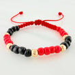 Red Woven Bracelet with Yellow Gold Beads 18K