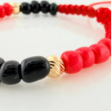 Red Woven Bracelet with Yellow Gold Beads 18K
