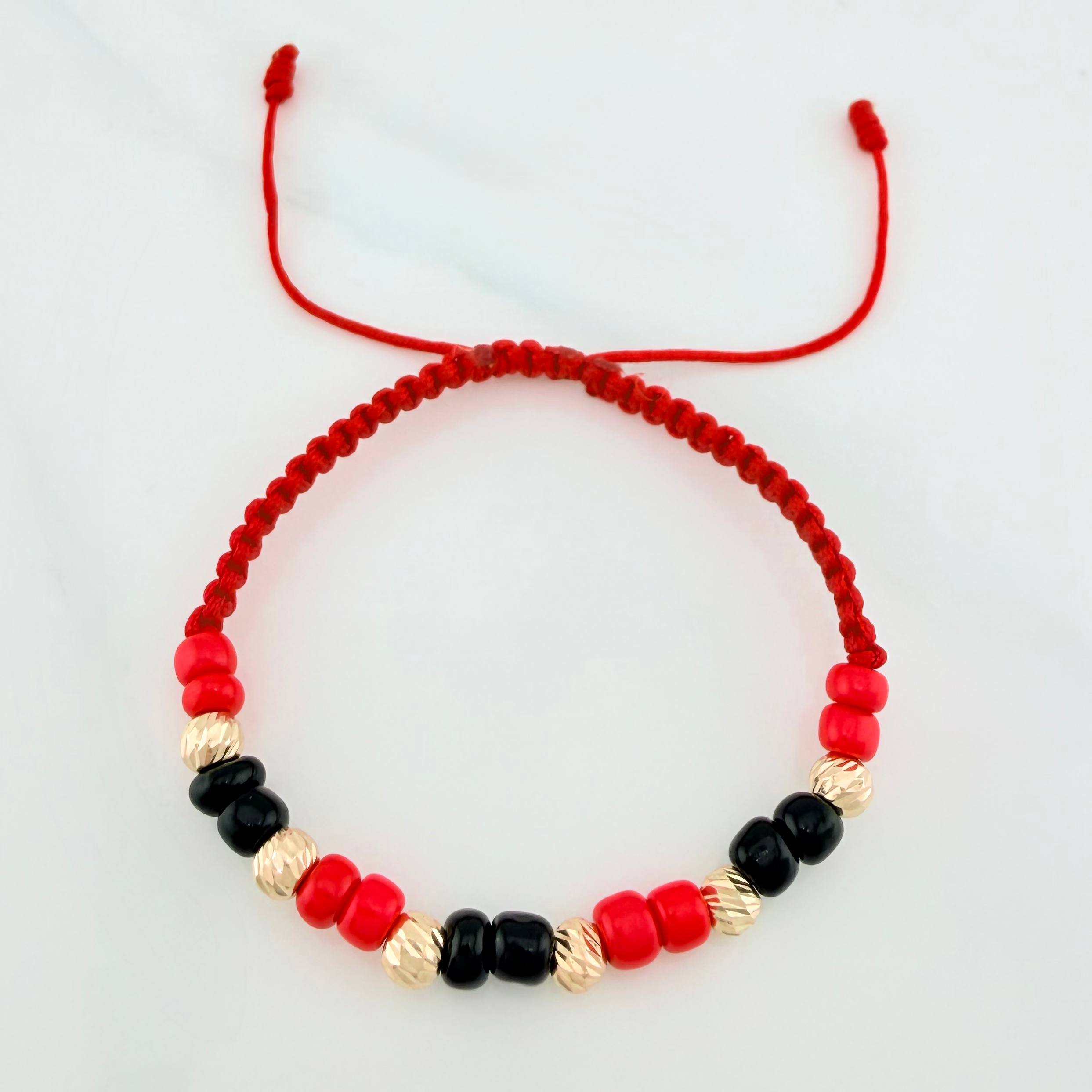 Red Woven Bracelet with Yellow Gold Beads 18K