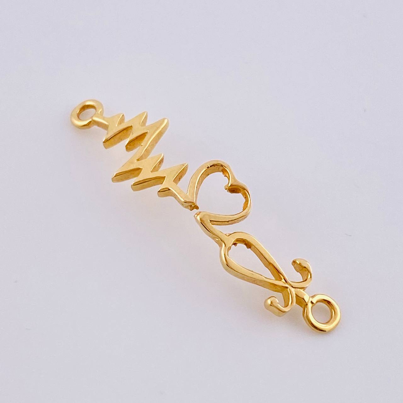 Herraje Corazon Electrocardiograma 0.8gr / 1 1/4 in / Oro Amarillo 18K