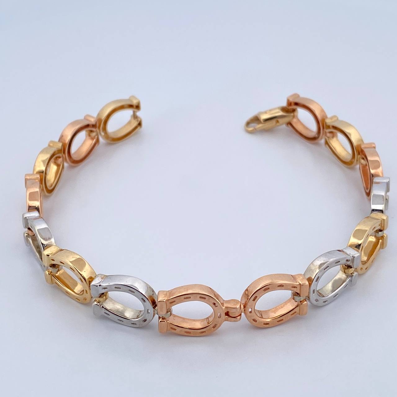 Horseshoe Bracelet 26.45gr / 7.7in / Three 18K Gold $